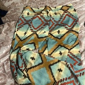 Double D flare legged pattern pants size large- excellent condition